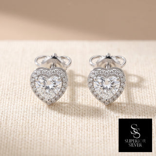 Sterling silver heart shaped halo moissanite stud earrings, macro detail