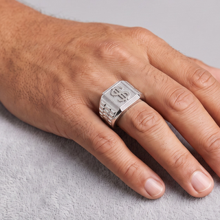 Iced Dollar Sign Square Signet Moissanite Ring in sterling silver, worn on hand