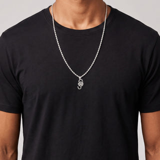 Iced-Out Scorpion Moissanite Pendant in sterling silver, worn on model