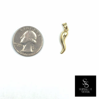 Italian Horn Cornicello 14K yellow gold pendant size comparison next to a US quarter