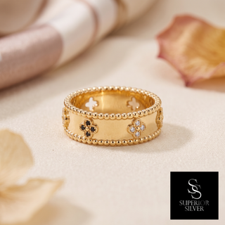 18K yellow gold diamond motif ring on display