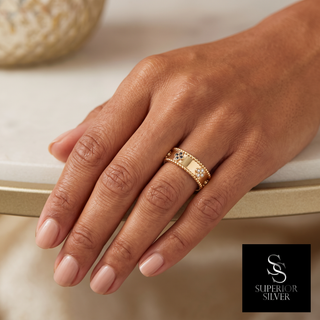Ladies 18K yellow gold diamond motif ring shown on hand