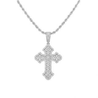 A silver-toned cross pendant necklace paved with small clear stones, hanging from a matching chain on a plain white background.