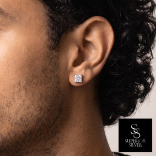 Large Princess-Cut Solitaire Moissanite Stud Earrings in sterling silver, worn on model