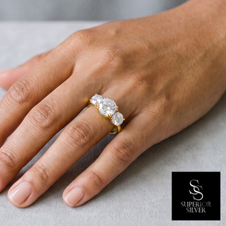 Large Round Three-Stone Moissanite Ring in yellow gold vermeil over sterling silver, worn on hand