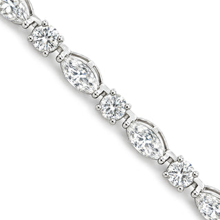 Marquise and round station moissanite tennis bracelet in sterling silver, close-up of marquise and round stones