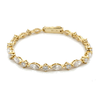 Marquise and round station moissanite tennis bracelet in yellow gold vermeil over sterling silver