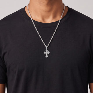Medium Gothic Budded Cross with Baguette Center Moissanite Pendant in sterling silver, worn on model
