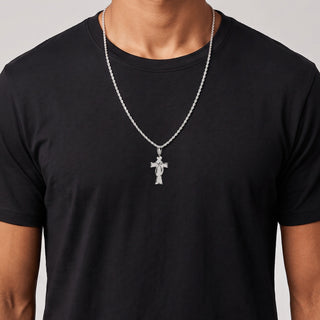 Micro-Pavé Cross with Crossover Band Moissanite Pendant in sterling silver, worn on model