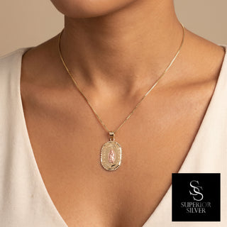 Mother Mary 10K Yellow Gold Pendant worn on a model