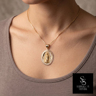 Mother Mary 14K Yellow Gold Pendant worn on a model