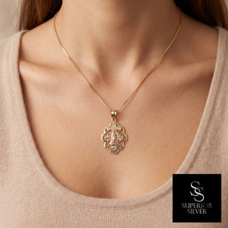 Mother Mary 14K Yellow Gold Pendant worn on a model