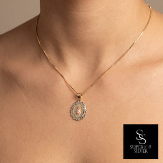 Mother Mary 14K Yellow Gold Pendant worn on a model