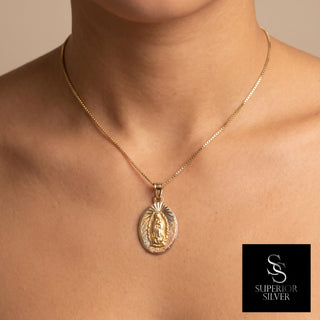 Mother Mary 14K Yellow Gold Pendant worn on a model