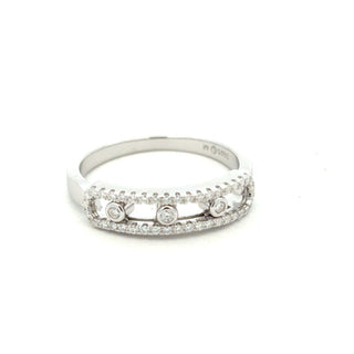 Open pavé rails with floating bezel stones moissanite ring in sterling silver