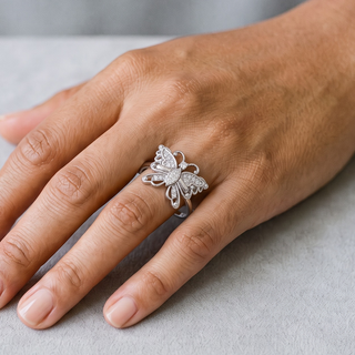 Openwork Pavé Butterfly Cocktail Moissanite Ring in sterling silver, worn on hand