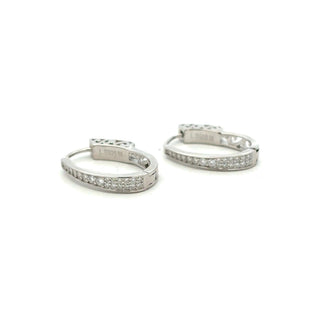 Oval pavé moissanite hoop earrings in sterling silver