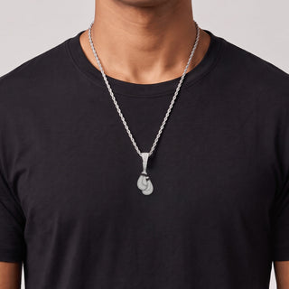 Pavé Boxing Gloves with Black Stone Cuffs Moissanite Pendant in sterling silver, worn on model