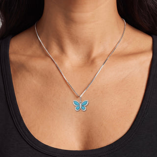 Pavé Butterfly Moissanite Pendant with Turquoise, Black Onyx or Opal in sterling silver, worn on model