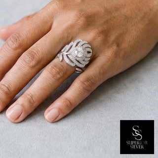 Pavé Feather Wrap Moissanite Ring in sterling silver, worn on hand