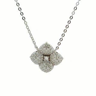 Pavé four-petal flower with center stone moissanite necklace in sterling silver
