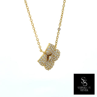 Pavé four-petal flower with center stone moissanite necklace in yellow gold vermeil over sterling silver