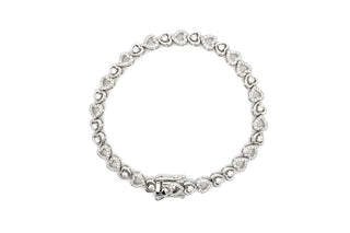 Pavé heart and solitaire heart link moissanite bracelet in sterling silver