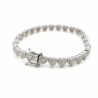 Pavé heart cluster moissanite tennis bracelet in sterling silver