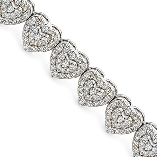 Pavé heart cluster moissanite tennis bracelet in sterling silver, close-up of pavé hearts