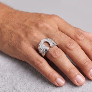 Pavé Horseshoe with Nugget Shoulders Moissanite Ring in sterling silver, worn on hand