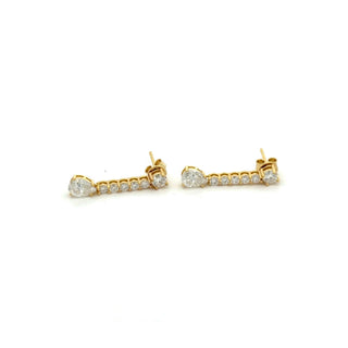 Pavé line pear drop moissanite earrings in yellow gold vermeil over sterling silver