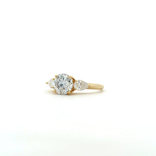 Pear-Flanked round three-stone moissanite ring in yellow gold vermeil over sterling silver