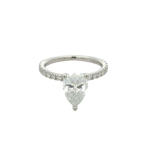Pear solitaire on pavé band moissanite ring in sterling silver