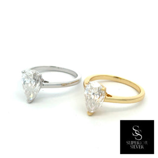 Pear solitaire on polished band moissanite ring in sterling silver and yellow gold vermeil, side by side
