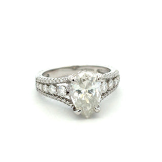Pear solitaire with graduated side stones moissanite ring in sterling silver