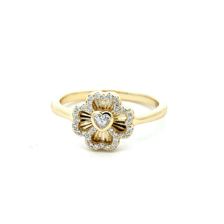 Polished four-petal flower moissanite ring in yellow gold vermeil over sterling silver