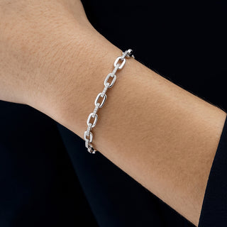 Polished Link and Pavé Bar Moissanite Bracelet in Sterling Silver worn on the wrist