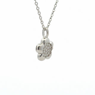 Polished petal flower pavé center moissanite necklace in sterling silver