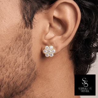 Polished side seven-stone flower cluster moissanite stud earrings in yellow gold vermeil over sterling silver, worn on model