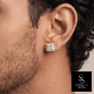Princess cut square halo moissanite stud earrings in yellow gold vermeil over sterling silver, worn on model