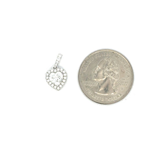 Prong-Set Heart-Cut Halo with Hidden Halo Moissanite Pendant in Sterling Silver, size comparison with a US quarter