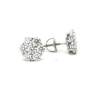 Prong-set seven-stone flower cluster moissanite stud earrings in sterling silver