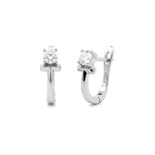 Prong-set solitaire moissanite huggie earrings in sterling silver
