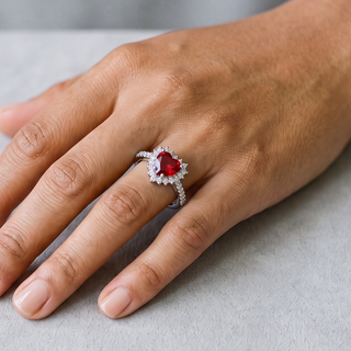 Red Heart Halo on Pavé Band Moissanite Ring in sterling silver, worn on hand