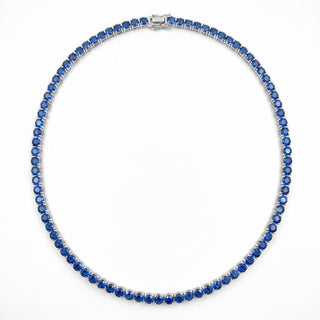 Superior Silver round cut blue sapphire tennis chain in rhodium plated 925 sterling silver with a box clasp.