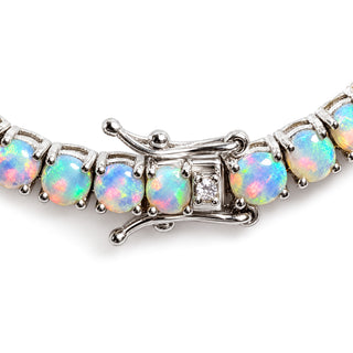 Round cut Ethiopian opal tennis bracelet in sterling silver, double-latch box clasp