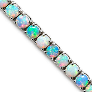 Round cut Ethiopian opal tennis bracelet in sterling silver, close-up of opals in four-prong settings