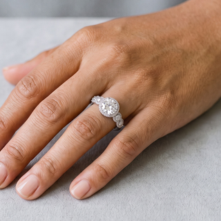 Round Halo with Milgrain Detail Moissanite Ring in sterling silver, worn on hand