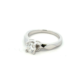 Round solitaire on faceted band moissanite ring in sterling silver