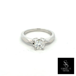 Round solitaire on faceted band moissanite ring in sterling silver, view 2